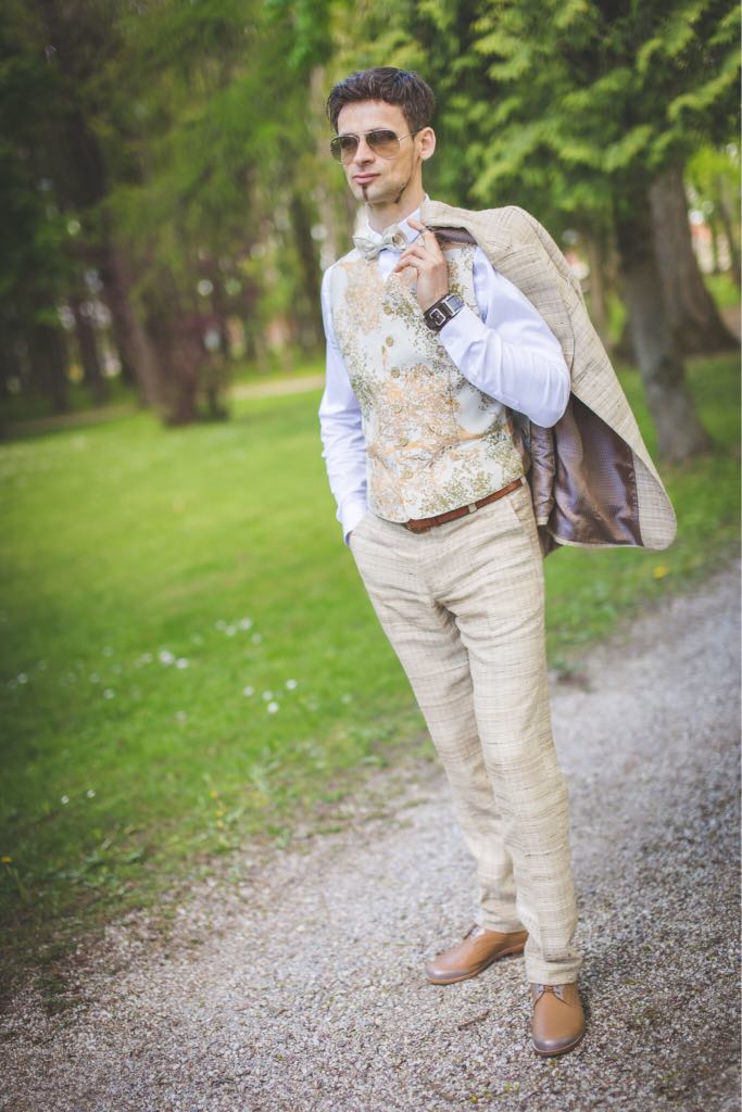 Man with custom vest and silk costume