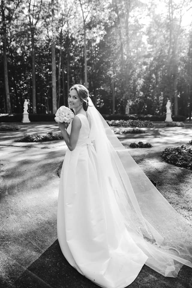 Bride in custom wedding dress