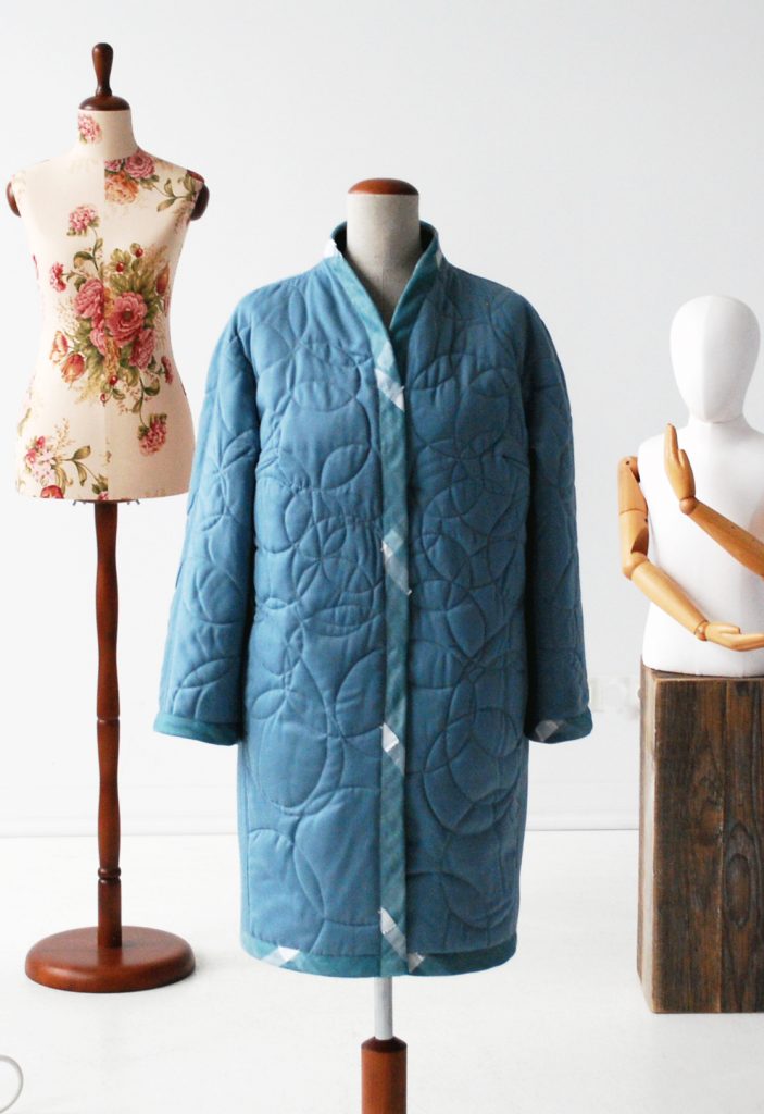 Quilted long coat blue color