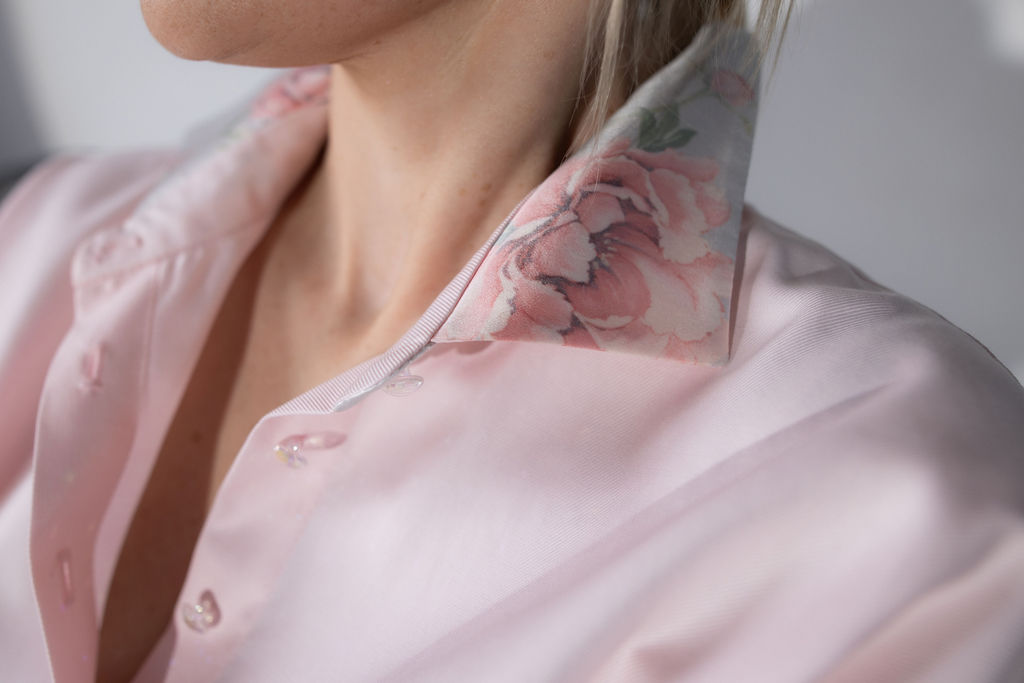 Light pink long-sleeve button-up shirt with a crisp collar and relaxed, modern fit. Silk flower print collar