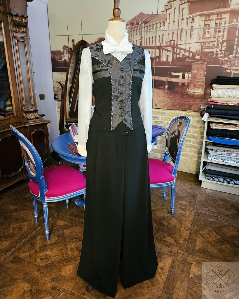 white shirt, vest and trousers on a manequin