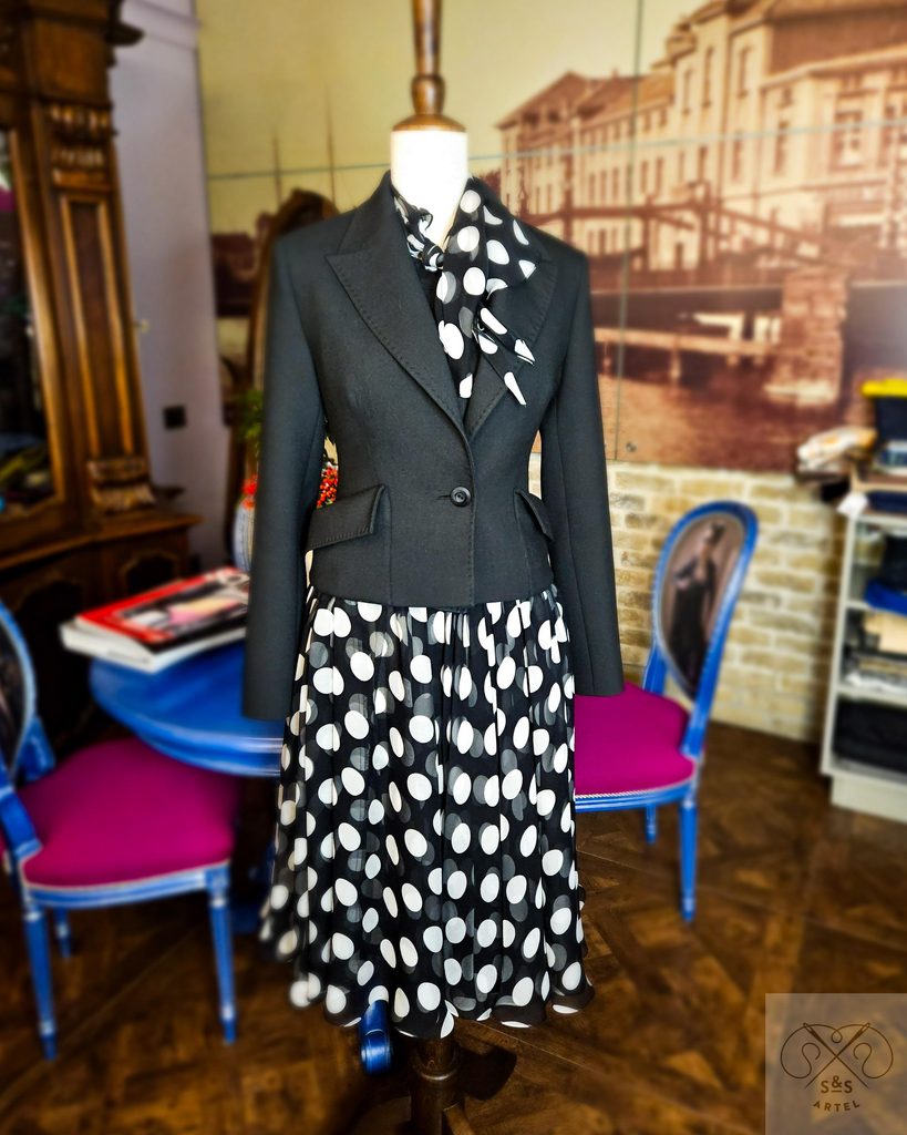 Black wool jacket and black polkadot silk skirt