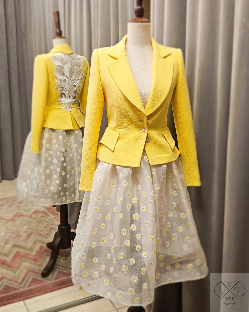 Elegant yellow jacket with see through back covered with lace and embroidered skirt