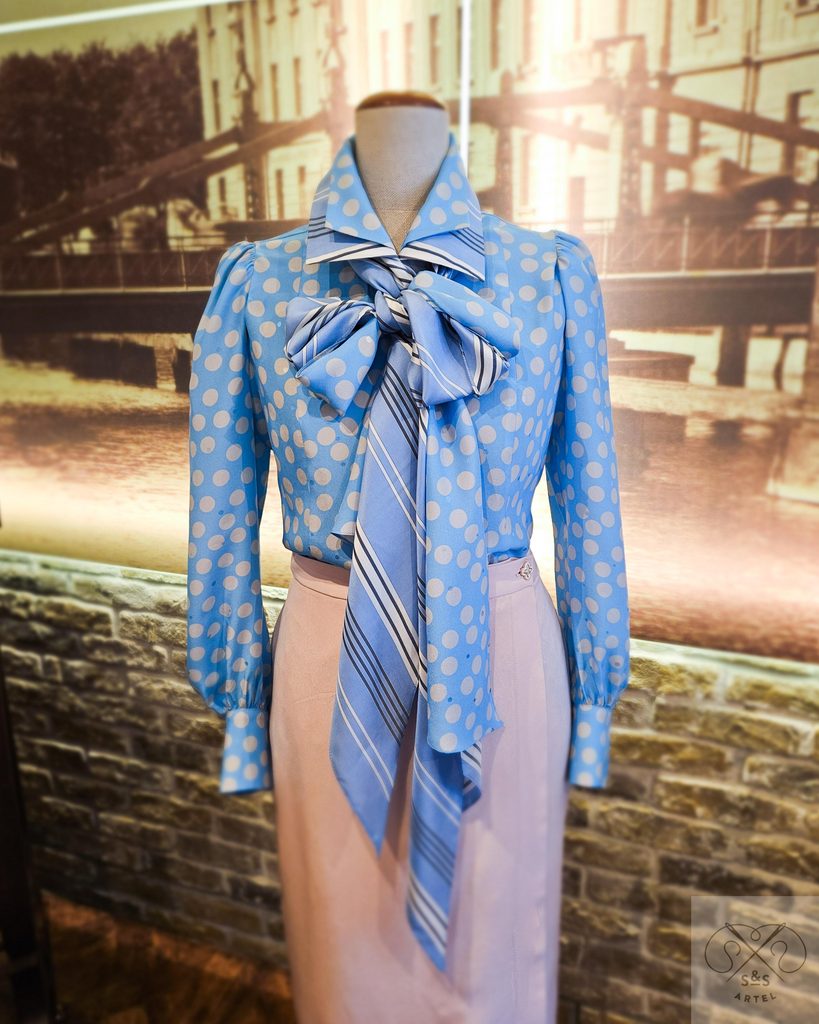 blue silk polka dot blouse with light pink pencil shape skirt