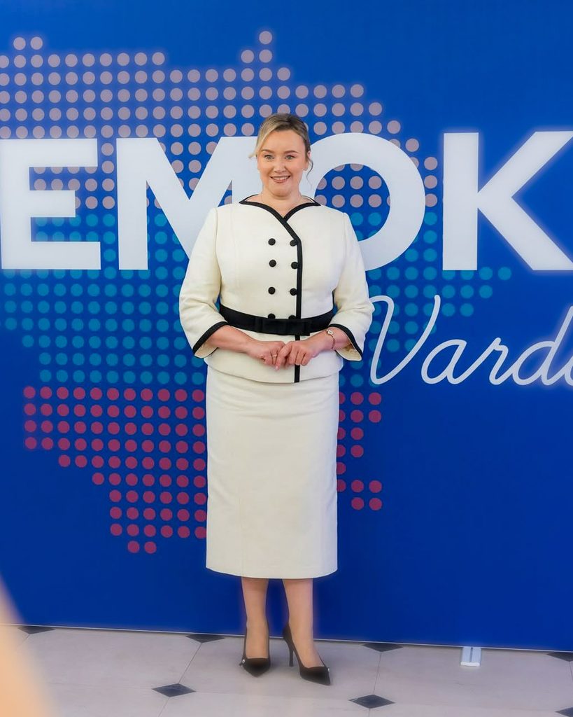 Elegant woman with white jacket, black belt and buttons. pencil shape skirt